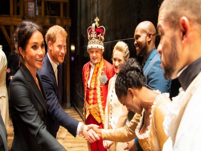 Prince Harry and wife Meghan Markle attend hit musical Hamilton in London
