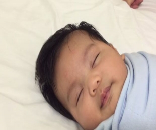 Watch: Father reveals trick to putting baby to sleep in 40 seconds