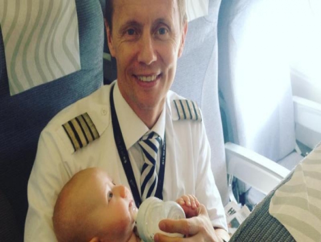 This Finnish pilot fed a baby on flight and it is the best thing you will see today