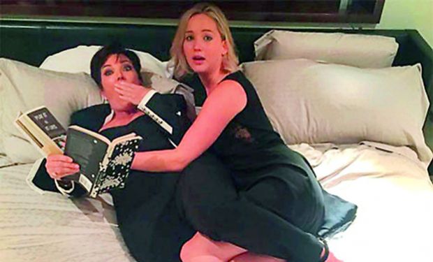 Kris Jenner in bed with Jennifer Lawrence