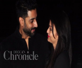 Abishek and Aishwarya get cute for the cameras